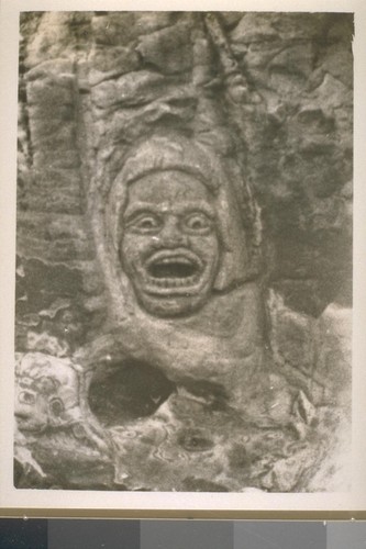 Stone head carving on cliff; Limantour Estero, Drake's Bay, Marin Co;. 1933; 5 prints, 2 negatives