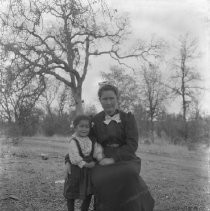 View of a woman with a child in a garden in Fair Oaks