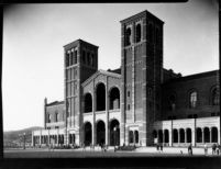 Royce Hall with students moving between classes, 1930