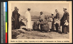Missionary fathers meet local porters, China, ca.1920-1940