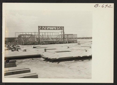 First truss erected in construction of new high school at Topaz. Photographer: Bankson, Russell A. Topaz, Utah