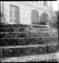 [Cognac: "André Renaud"; stone steps outside country house]
