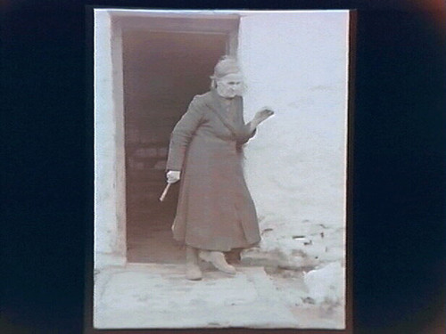 Old Woman in Cottage Doorway