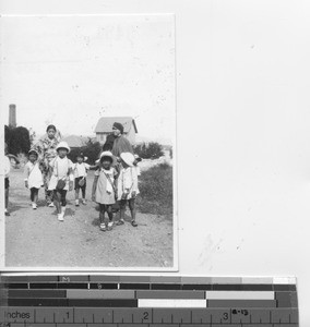 Maryknoll Sister with Kindergarteners at Dalian, China, 1934