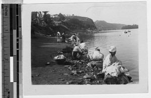 Washing along the banks of the Taidong River, Peng Yang, Korea, ca. 1920-1940