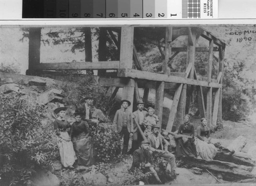 Group of hikers resting by the Old Mill after a hike to Muir Woods