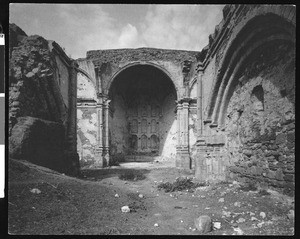 Exterior view of the San Juan Capistrano Mission, showing the ruined altar and triple arches
