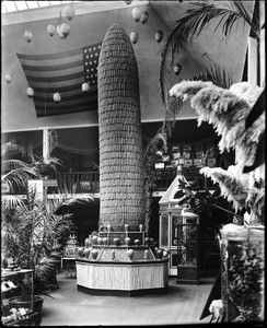 View of the "Corn Tower" on display in the exhibit room of the Los Angeles Chamber of Commerce building, 1902