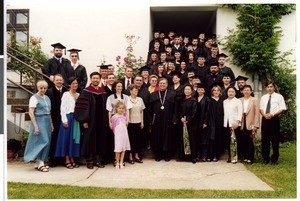 Group photograph of Osijek Evangelical Theological Seminary's faculty and students after the graduation ceremony