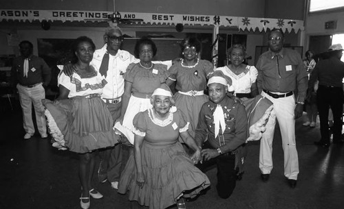 Van Meter Squares dancing group members posing together, Los Angeles, 1989