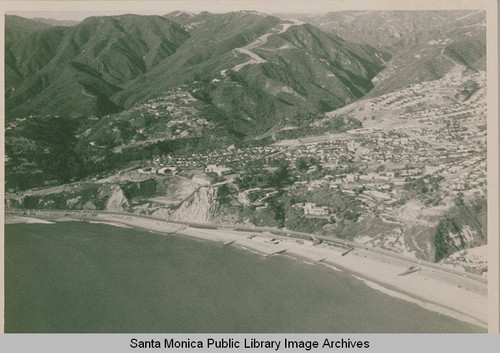 Aerial view of coastline and the Bel Air Bay Club site, Pacific Palisades, Calif., February 15, 1959