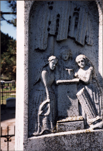 Headstone Depicting Three Mourners