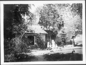 Mrs. Guth and her children (?) in front of the mission house, Gonja, Tanzania, ca.1927-1938