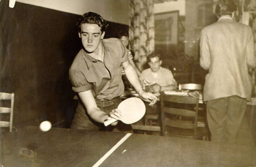 [Thomas McGuire playing ping pong at the Mission Teen-age Center in the Mission district]