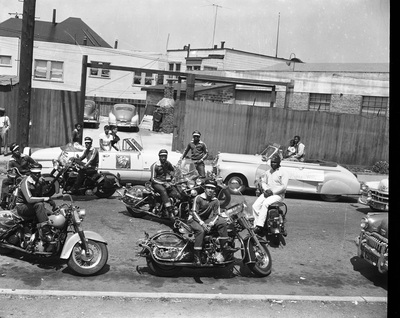 Berkeley Tigers Motorcycle Club parked in street