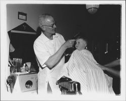 Getting a first haircut, Petaluma, California, 1958