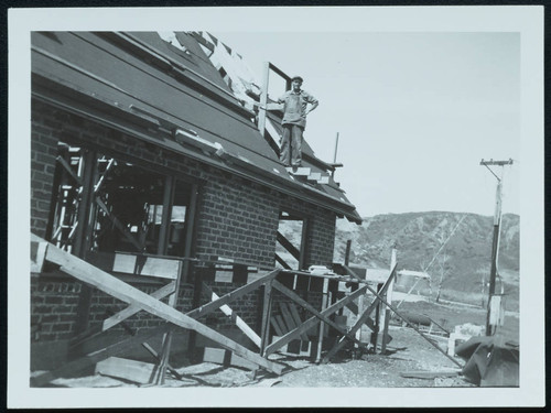 Man on roof of The '47 House