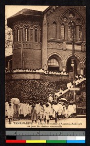 People gathered outside of a large brick Protestant church, Madagascar, ca.1920-1940