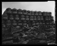 Pacific Electric Railway cars piled atop one another at junkyard on Terminal Island, Calif., 1956