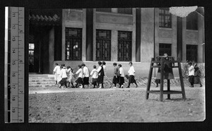 Ginling College students on their way to services, Nanjing, Jiangsu, China, 1923