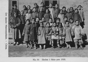 A postcard with photo of children outside the school in Hsiu-yen, 1908