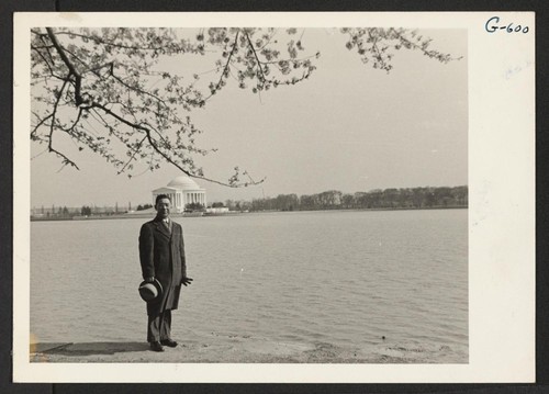 Rev. Thomas Machida visits the Tidal Basin in Washington. The Jefferson Memorial is seen in the background. Rev. Machida is working for the Federal Communication Commission and, like several other evacuees in Washington, is living in one of the government housing projects. "Washington, D.C."