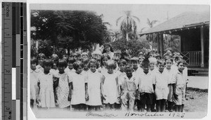 Sister Chanel Xavier, MM, with Maryknoll primary school students, Punahou, Honolulu, Hawaii, 1928