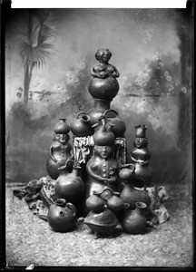 View of a stack of Pima Indian pottery, ca.1884