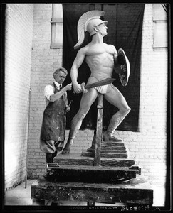 Sculptor working on the Tommy Trojan statue of the University of Southern California