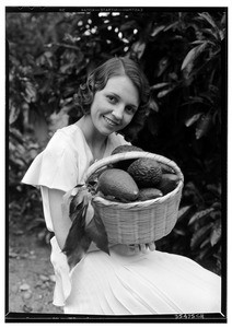 Miss Margaret Thornton with Calavo avocados, May 1932