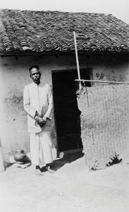 Madras, Arcot, South India. From "Mrs. Lazarus' Poor School". Teacher in front of his rented ac