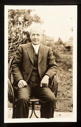 Luther Burbank Seated in Garden, about 1920