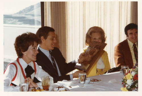 Nancy Reagan, President Banowsky holding a presentation, Mrs. Brock