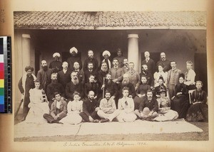 Formal group portrait of L.M.S. South India Committee, Belgaum, Karnataka, India, 1892