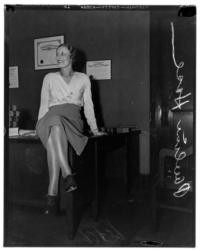 Pauline Hose, girl sitting on desk
