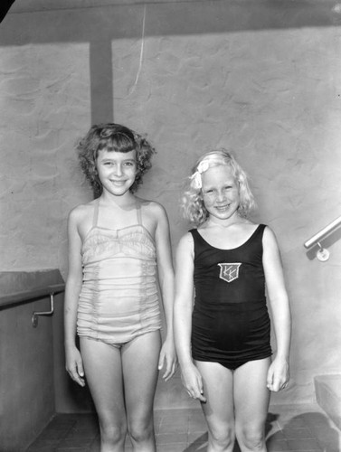 Two girls in bathing suits