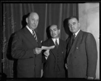 Howard S. Dudley, Tom May, and W. A. Holt raise money on behalf of the Community Chest, Los Angeles, 1935