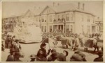 [View of parade and spectators]