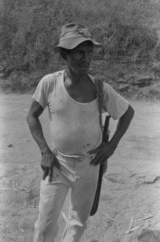 Half length portrait of a man standing in the street, San Basilio de Palenque, ca. 1978