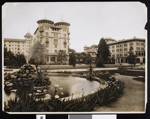 Exterior view of the Green Hotel and annex from a nearby fountain, ca.1905