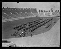 Elevated view of the annual police inspection at Los Angeles Memorial Coliseum, Los Angeles, 1927