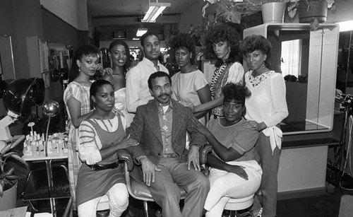 Beauty shop staff posing together in a salon, Los Angeles, 1984