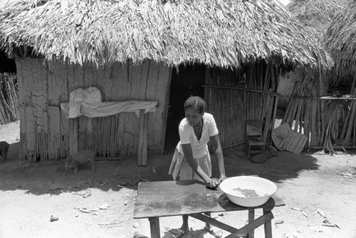 Woman washing a table, San Basilio de Palenque, 1976