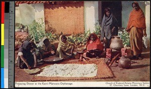 Women preparing dinner outdoors, India, ca.1920-1940