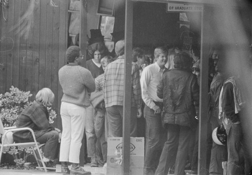 Students giving support to fellow students who were summoned to appear at the UCSD Police station for their involvement earlier in the month of taking over Urey Hall on the UCSD campus in protest against the Vietnam War. May 27, 1970