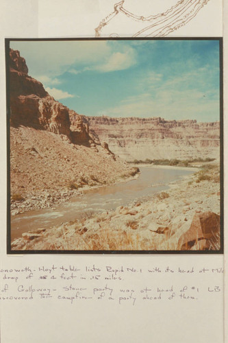 Upstream view of Colorado River in Cataract Canyon from approximately Mile 212.2. First rapid shows at left. Greenery in middle distance is at mouth of side canyon which enters river at Mile 213 opposite Spanish Bottom
