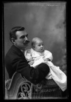 Portrait of man with baby
