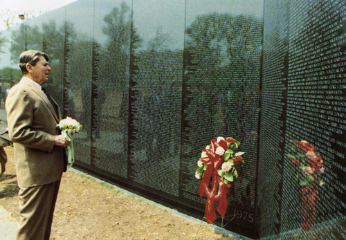 Official White House photograph of Former President Ronald Reagan at the Vietnam Veterans Memorial Wall