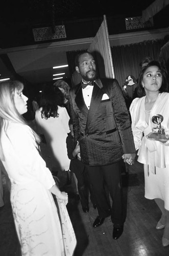 Marvin Gaye standing backstage with others during the 25th Annual Grammy Awards, Los Angeles, 1983