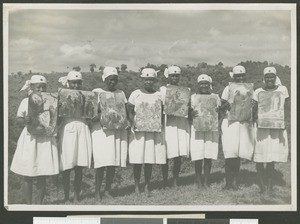 Nurses holding biblical illustrations, Chogoria, Kenya, March1949